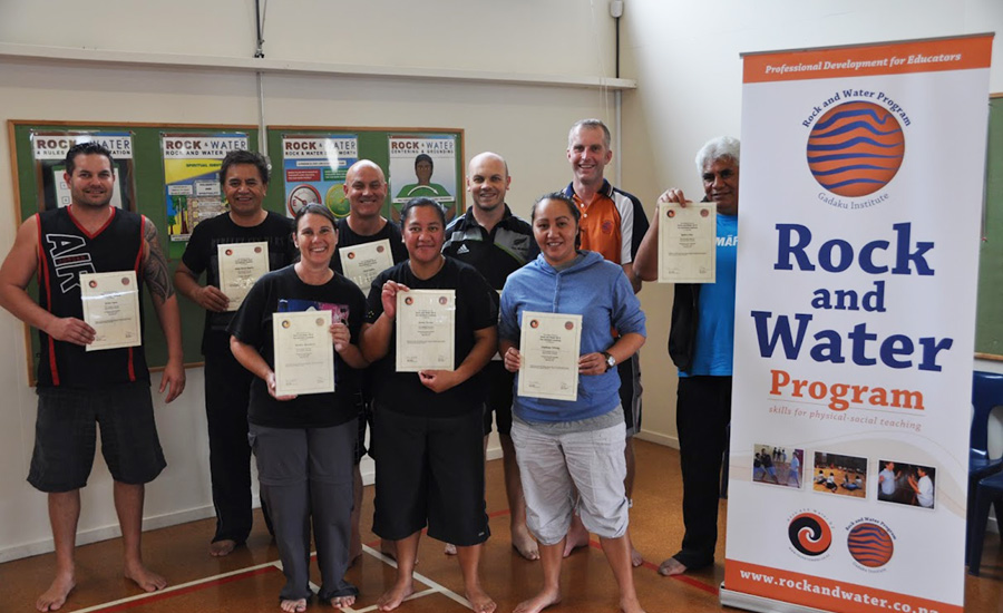 Happy trainees showing their certificates